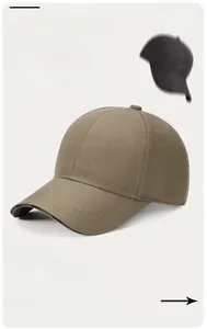 Close-up of khaki baseball cap featuring BLACK embroidery and FASHION decorative brim strap