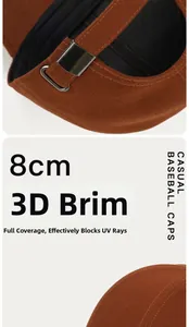 Detail of caramel baseball cap featuring 8cm brim and adjustable metal strap buckle