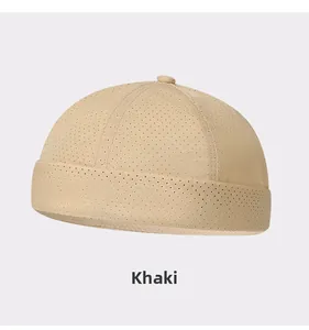 Macro detail of the breathable khaki mesh fabric on the lightweight summer miki hat