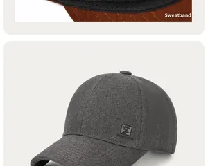 Detail view of deep gray baseball cap featuring a built-in sweatband and decorative patch