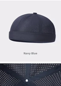 Detail of navy blue mesh docker hat showing breathable fabric and internal reinforced stitching