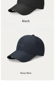 Detailed close-up of embroidered letters on black and navy blue baseball caps
