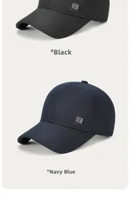 Detailed view of baseball caps in black and navy blue featuring Good Luck embroidery
