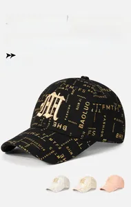 Detail of high-quality embroidered logo and gold prints on structured baseball cap