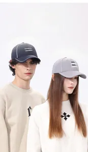 Detail of quick-dry baseball cap with Travel Californian print and reflective trim
