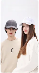 Close-up of quick-dry baseball caps with contrast stitching and curved brim design