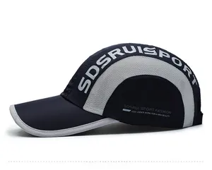 Side view of quick-dry baseball cap featuring breathable grey mesh and navy blue paneling