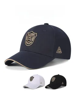 Close-up of the reinforced hard top crown and detailed shield embroidery on the baseball cap