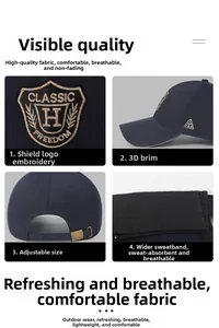 Close-up of shield embroidery and adjustable metal buckle on navy blue cotton baseball cap
