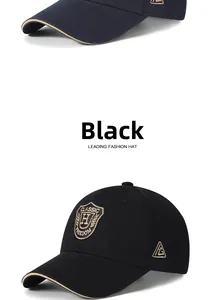 Close-up of classic shield embroidery and khaki contrast piping on the black baseball cap