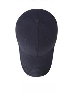 Top view of plain dark baseball cap showing reinforced brim stitching and fabric texture
