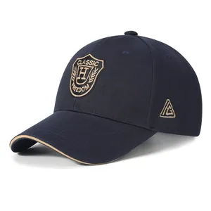 Classic navy cotton baseball cap with shield embroidery and contrast brim sandwich detail