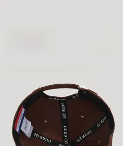 Detail view of the baseball cap's inner lining featuring soft sweatband and logo stitching