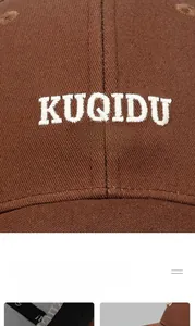 Detailed close-up of brown cotton baseball cap featuring high-quality 3D letter embroidery
