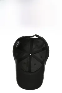 Detail of 100% cotton washed baseball cap showing sweatband and adjustable metal buckle