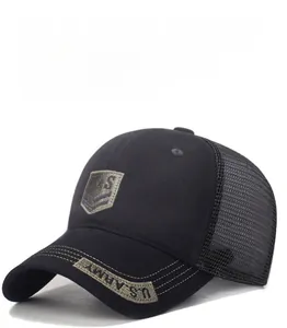 Detail of US shield patch and US ARMY embroidery on a black mesh trucker hat brim