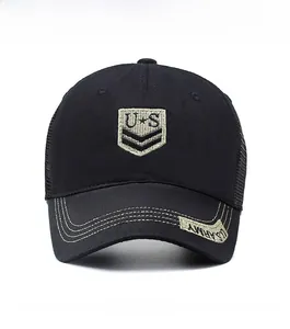 Close-up of black mesh baseball cap with U.S. shield patch and yellow embroidery
