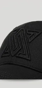 Detailed close-up of premium 3D black embroidery on high-density twill baseball cap