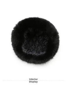Interior view showing thick black faux fur lining and quilted diamond pattern for warmth