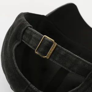 Adjustable washed cotton baseball cap with vintage metal buckle in charcoal black