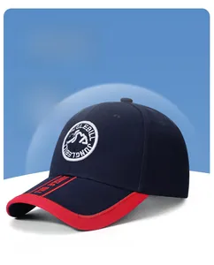Macro detail of navy baseball cap featuring 3D embroidery and red brim stripes