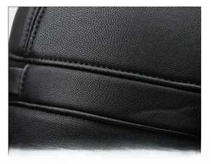 Detail of premium black PU leather trapper hat showing high-quality double stitching on top