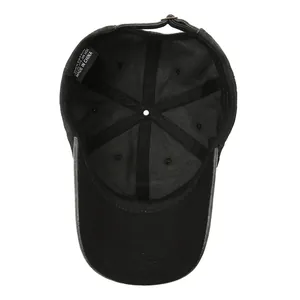 Inside view of vintage washed cotton baseball cap showing internal lining and care labels