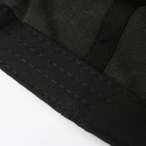 Close-up of black washed cotton baseball cap with durable parallel stitching details