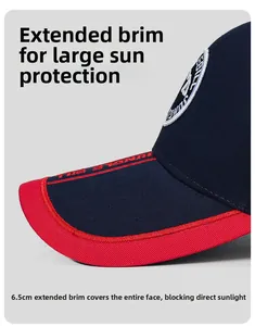 Close-up of 6.5cm extended brim on navy cotton baseball cap with red 3D embroidery detail