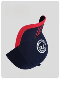 Detail view of Jungle Bill baseball cap featuring red and blue color-block brim and embroidery