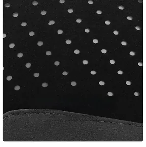 Close-up of black breathable mesh fabric with reinforced stitching on baseball cap