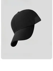 Close-up of laser-cut ventilation holes on lightweight quick-dry black running cap