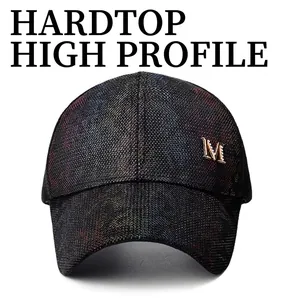 Iridescent baseball cap with metallic M logo and rhinestone detail for sun protection