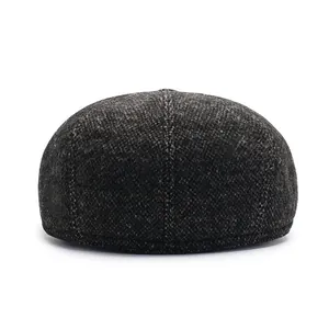Winter men's brown tweed flat cap with thick wool warmth and vintage newsboy style