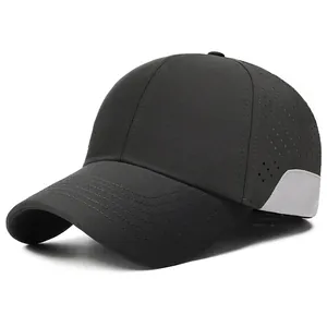Quick-dry black baseball cap with laser-cut side vents and gray color-block design