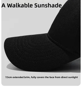 Detail of the 7.5cm extended brim on a black baseball cap for enhanced sun protection