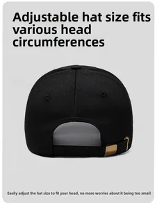 Detail of black baseball cap back with adjustable strap and metallic buckle closure