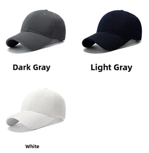 Detailed view of textured baseball caps in dark gray, light gray, and white colors