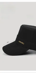 Detail of black military flat top cap with 6cm brim and golden JUNGLEBILL embroidery