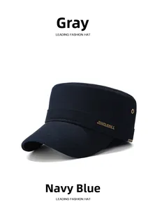 Detail view of the navy blue flat top cotton cap with a metallic Junglebill logo