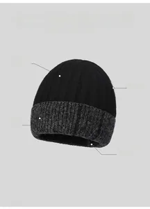 Detail of winter beanie featuring soft knitted fabric and thick warm fleece lining