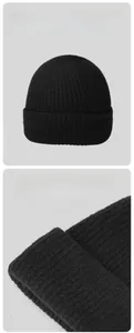 Detail of tight vertical rib knitting and double-layered cuff on black thermal beanie