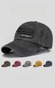 Detailed close-up showing washed cotton texture and various color options for the baseball cap