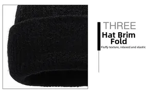 Detail of the brim cuff on a black knit beanie showing fluffy touch and elastic fabric