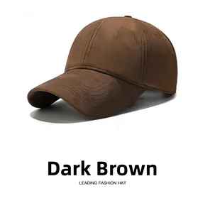 Close-up of winter baseball cap in dark brown faux suede with detailed brim stitching