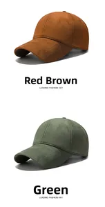 Detail view of reddish brown and green suede baseball hats with soft lining and vent holes