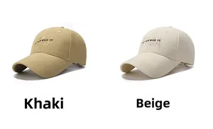 Detail view of cotton baseball caps in khaki and beige with embroidered lettering