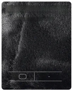 Detail of warm black faux fur lining for winter trapper hat with thermal locking texture