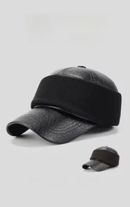 Detail of winter baseball hat with leather texture and thick fleece lining for warmth
