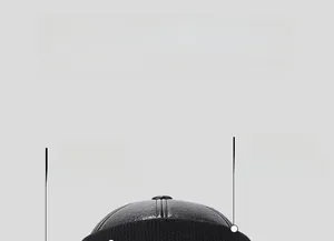 Detail of winter baseball cap with enlarged crown and deep fit in black faux leather